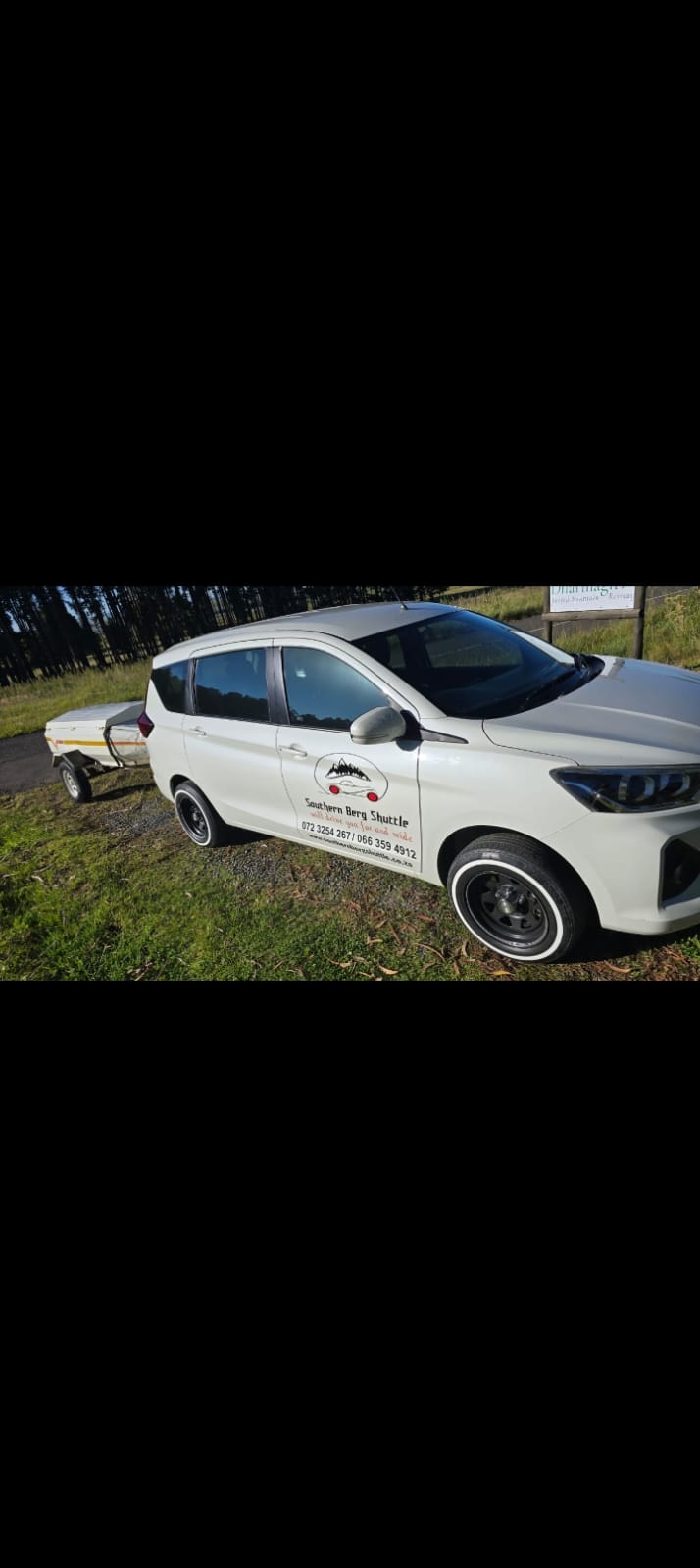 Southern Berg Shuttle Suzuki Ertiga with luggage trailer at Dharmagiri Mountain Retreat